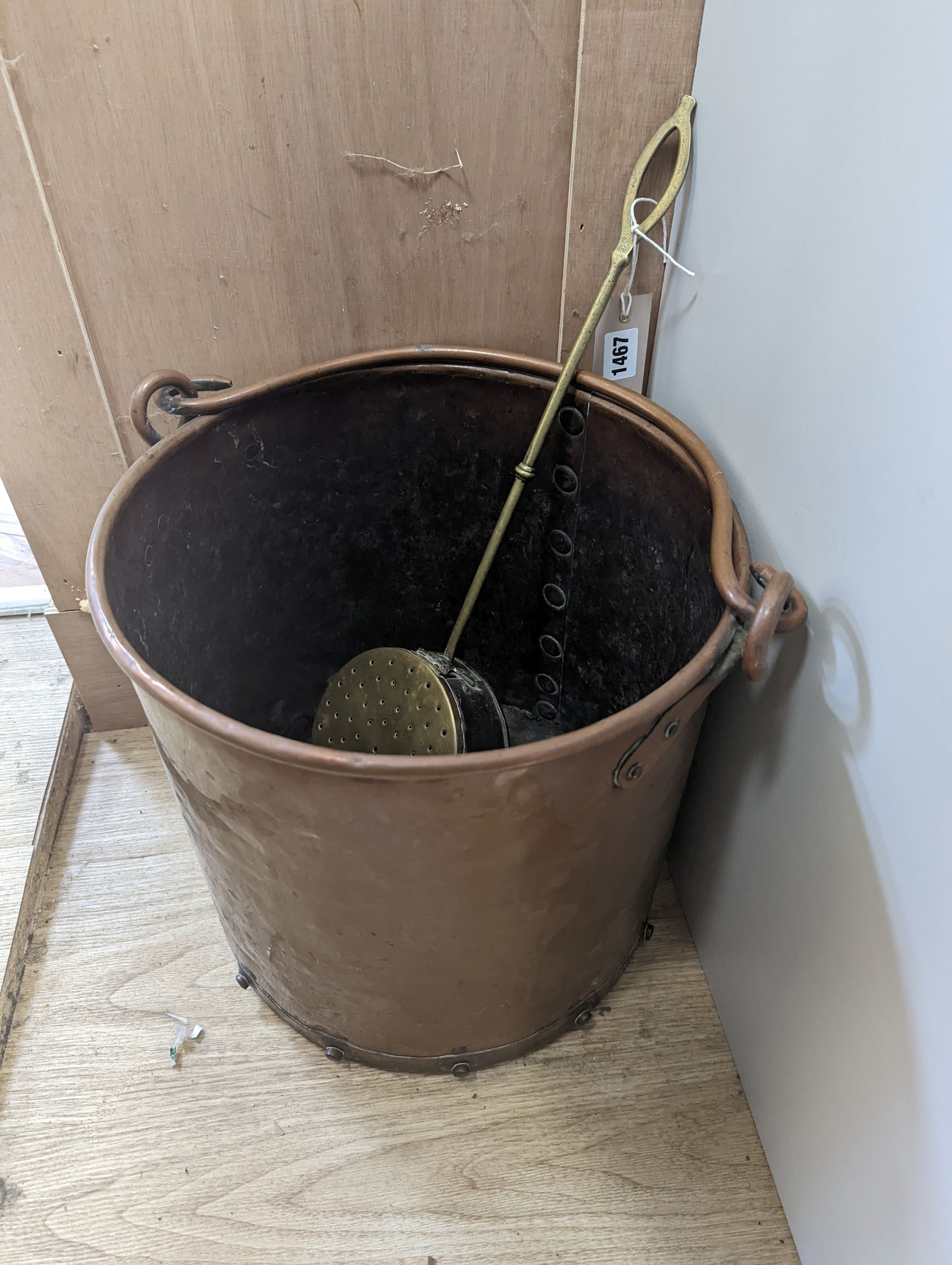 A Victorian cylindrical coal bucket, and a chestnut roaster, pail 30 cms high.